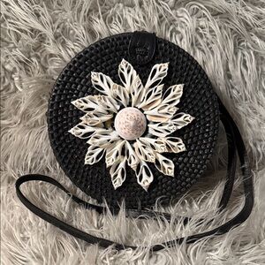 Amerii Chic Black Crossbody Bag with Floral Shell Accent